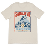 Vintage Sarajevo 1984 winter sports inspired graphic t-shirt featuring mountain scenery and a retro travel poster design on a premium cream cotton t-shirt.