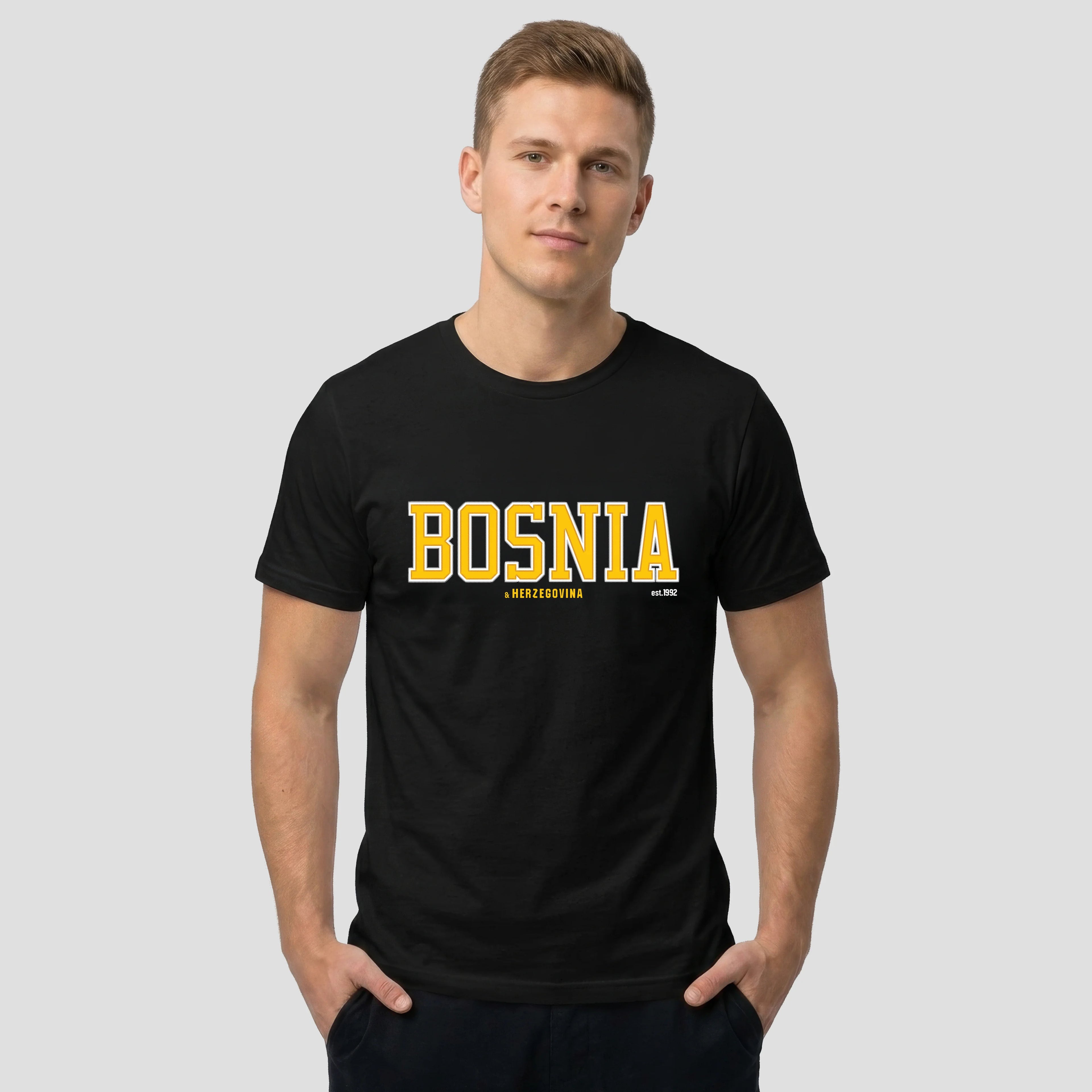 Man wearing a black t-shirt with 'BOSNIA' on the front