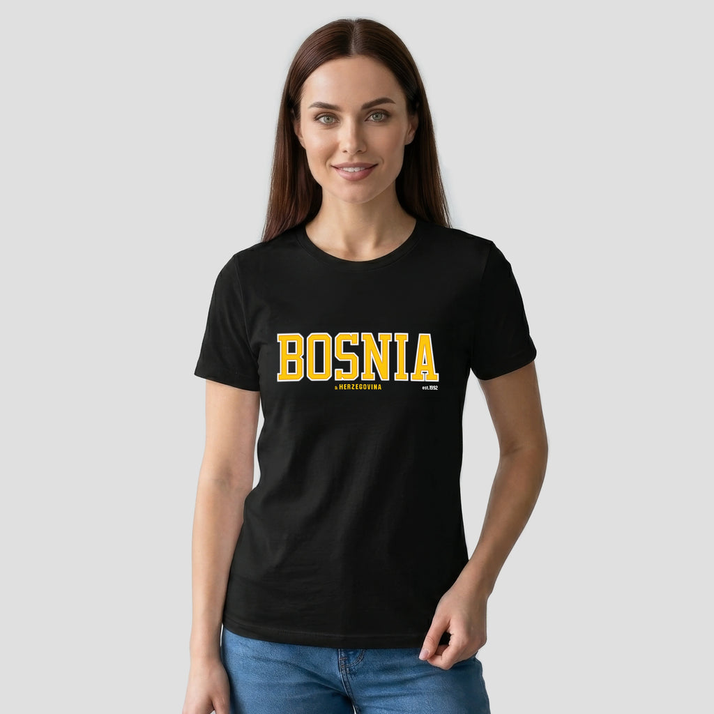 Woman wearing a black t-shirt with 'BOSNIA' printed in yellow.