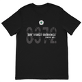 Don't Forget Srebrenica 8372 memorial t-shirt featuring the Srebrenica Flower and remembrance typography on a premium black cotton t-shirt.